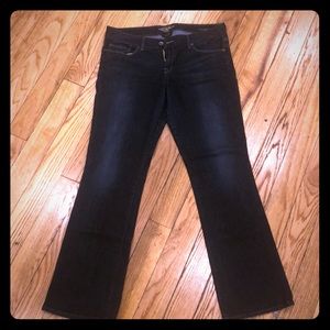 Lucky brand dark washed blue jeans.
